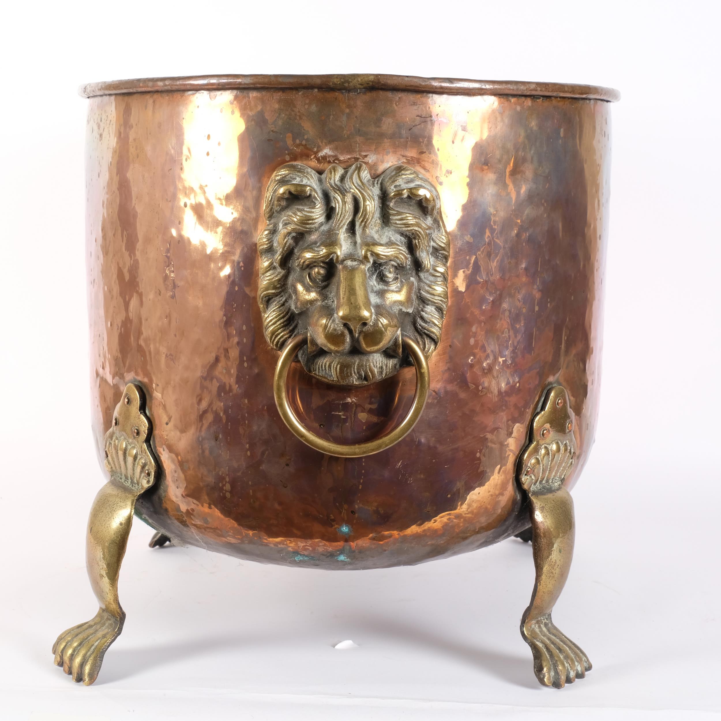 A large Victorian hammered copper jardiniere, with cast-brass lion mask ring handles, and brass - Image 2 of 2