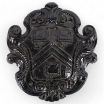 A painted cast-iron coat of arms "The Worshipful Company of Sadlers", H25cm