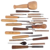 A collection of Vintage wood carving chisels, and mallet