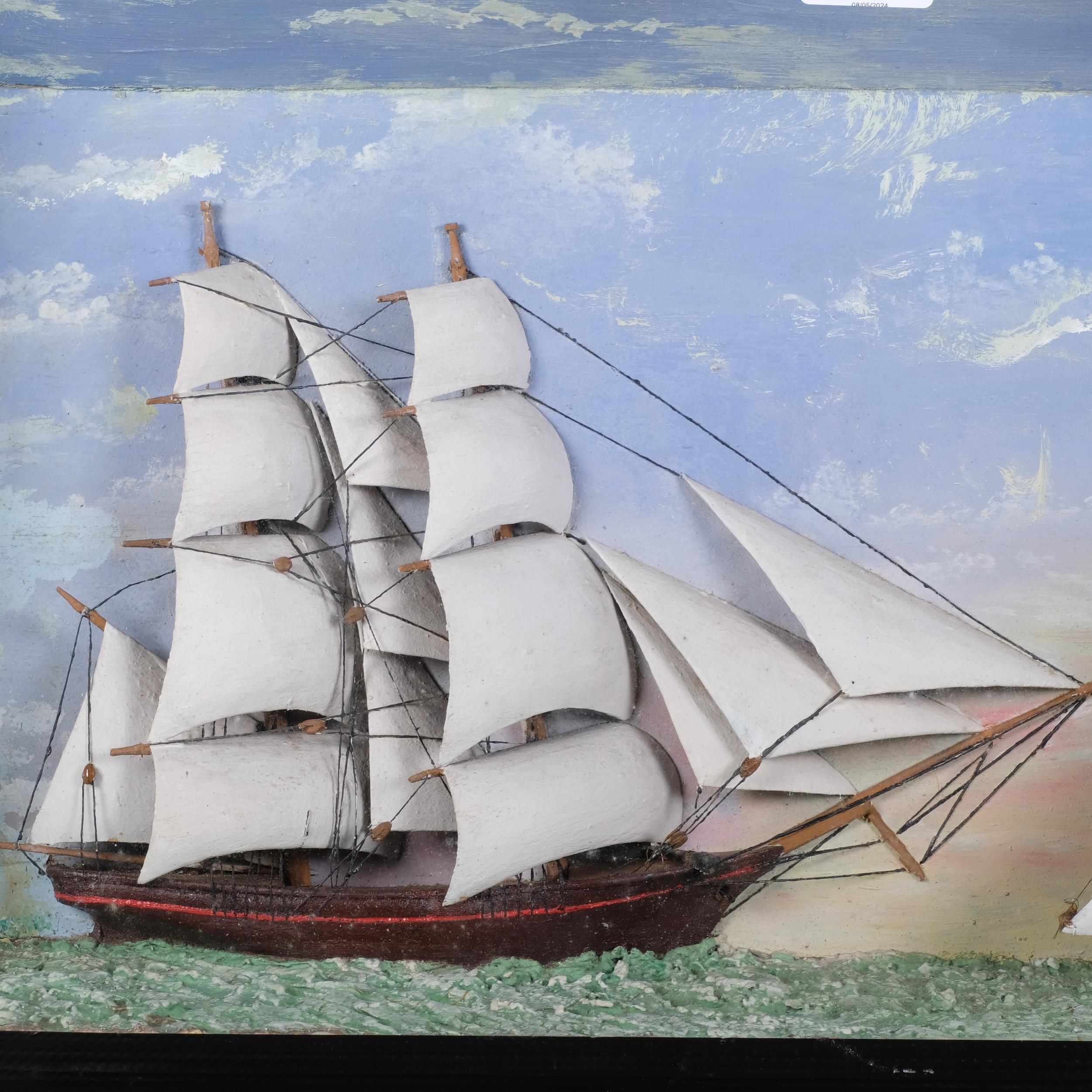 A 19th century ship diorama, depicting a 2-masted sailing ship and single-masted boat in - Image 2 of 2