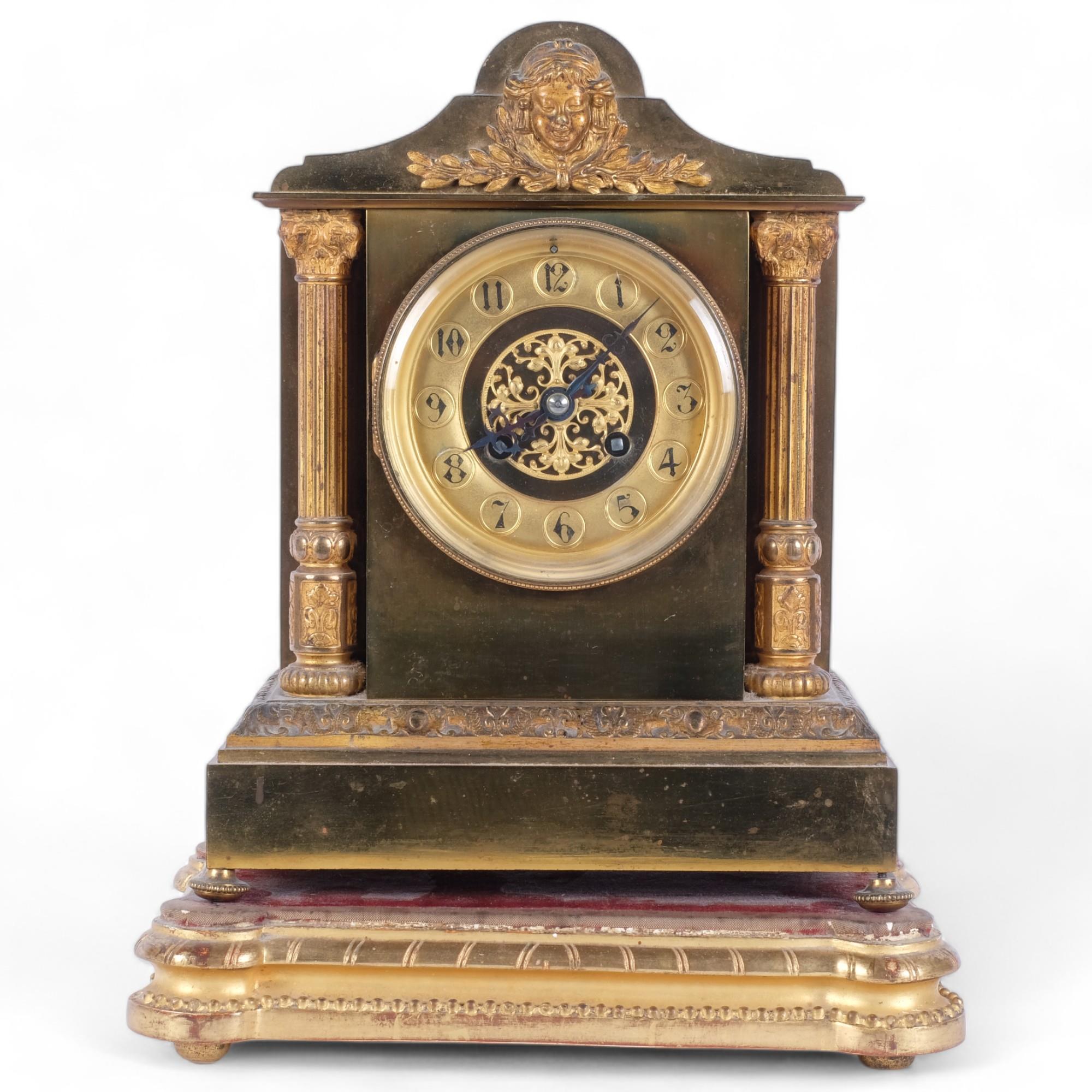 A 19th century French gilt-metal mantel clock of architectural form, 8-day striking movement,