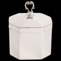 A George V silver tea caddy with hinged lid of canted form, H9.5cm, 3.5oz