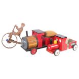 An early 20th century European wooden push toy man on bike, and a scratch-built wooden sit-on