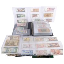 A large album full of world banknotes