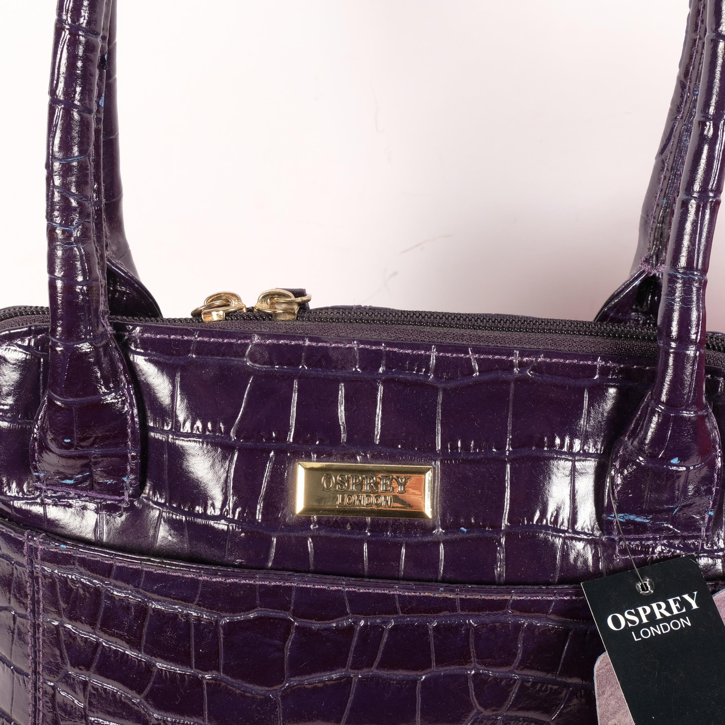 2 similar Osprey London leather handbags, 1 red and 1 purple, both with associated dust packaging - Image 2 of 2