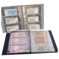 2 albums of various world banknotes, including Hong Kong