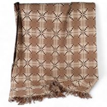 A Welsh woven wool reversible blanket in brown and cream, 234cm x 184cm, some holes