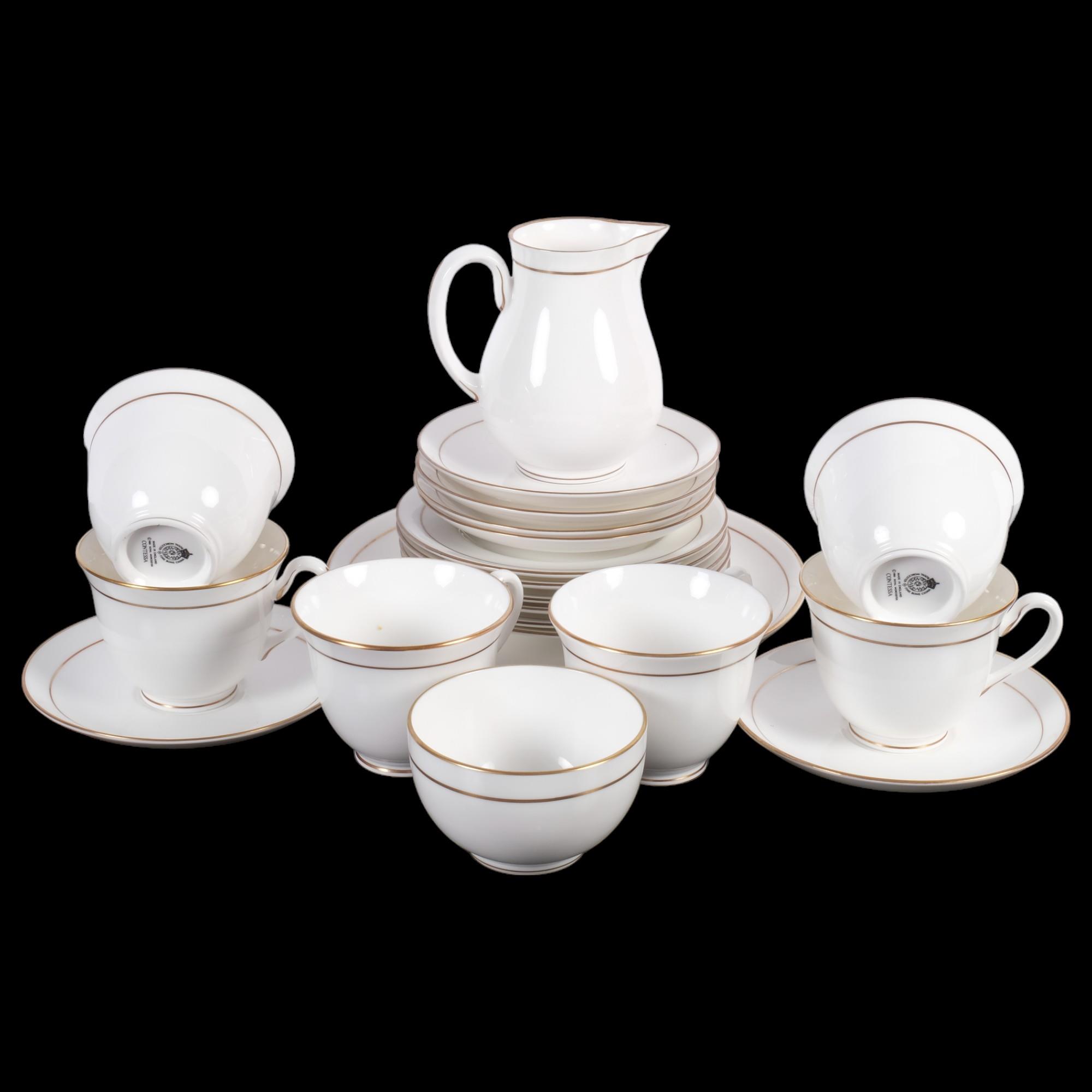 A Royal Worcester Contessa tea set for 6 people (jug repaired)