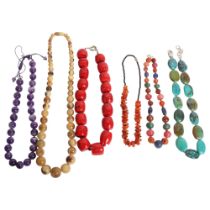 A group of bead necklaces, including coral, turquoise, carnelian, amethyst, etc