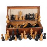 A set of turned wood Vintage chess pieces, in associated Vintage wooden case