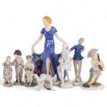 A group of Continental porcelain figures, including a Royal Dux skater, 17.5cm, Naples cherub,