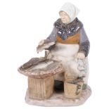 Bing & Grondahl, a porcelain figural group, the fish seller, no. 2233, H21cm Good condition