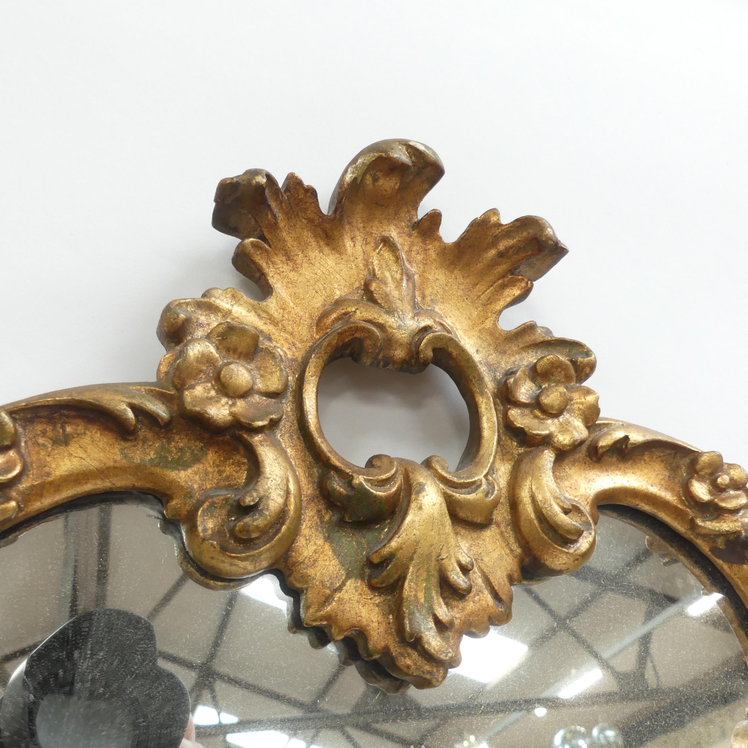 A gilt-framed Italian baroque style mirror. Height 73cm. - Image 2 of 2