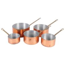 A graduated set of 5 copper saucepans with brass handles, largest diameter 20cm