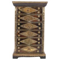 An Indian wood and pressed brass table-top narrow chest of 6 short drawers, 24cm x 38cm x 15cm