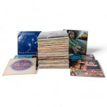 A quantity of vinyl LPs and 12" singles, various artists and genres, including David Bowie, Cliff