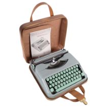 Vintage Hermes Baby portable typewriter, in case