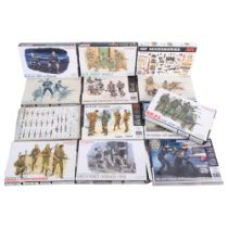 A quantity of plastic model display kits, mostly military related in nature, various brands and