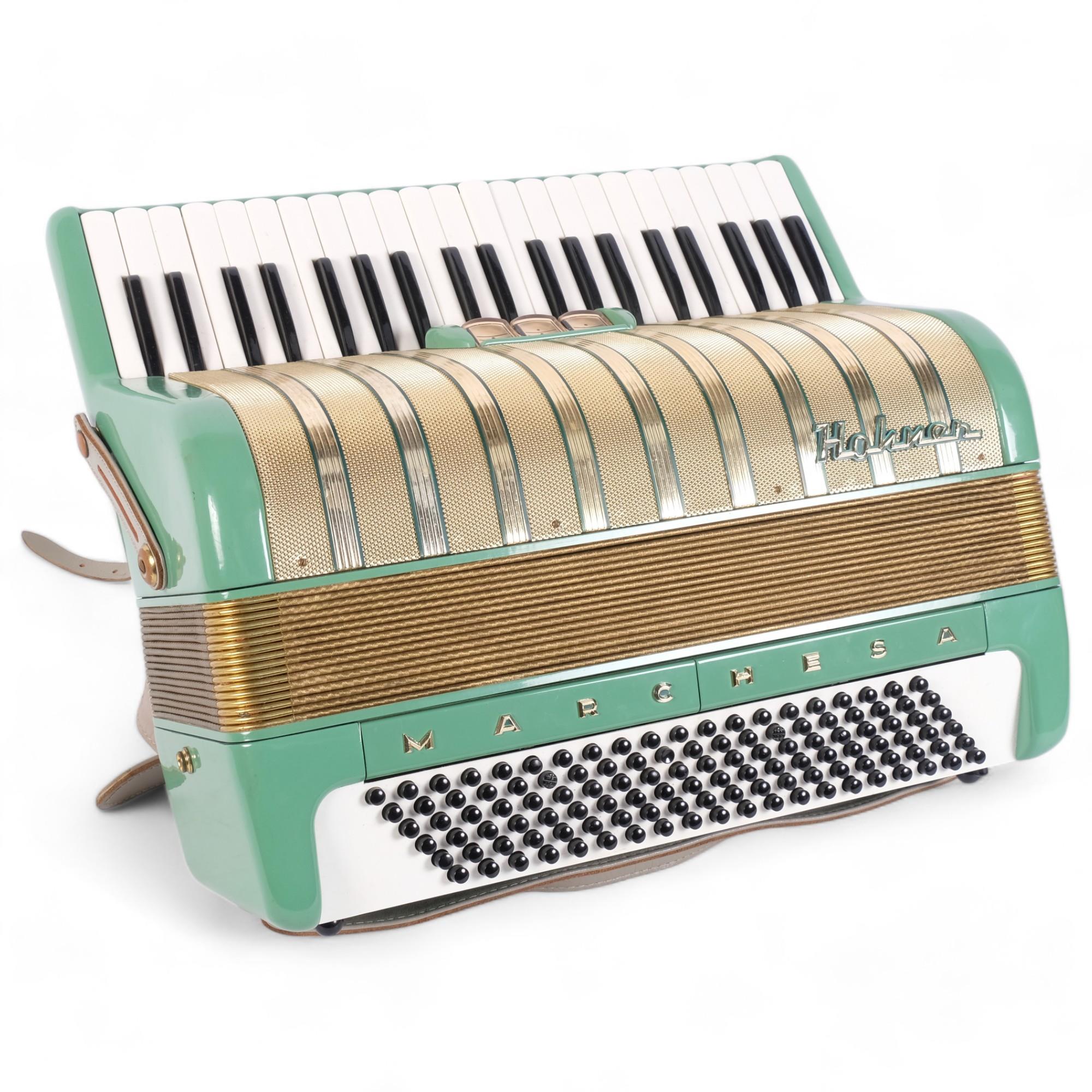 A Hohner, 'Marchesa', piano accordion, 120 button, in original hard shell case, with associated