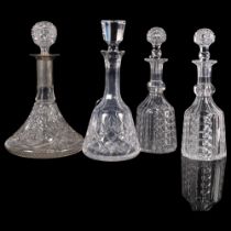 A pair of cut-crystal decanters and stoppers, and 2 others, including 1 with silver plated collar,