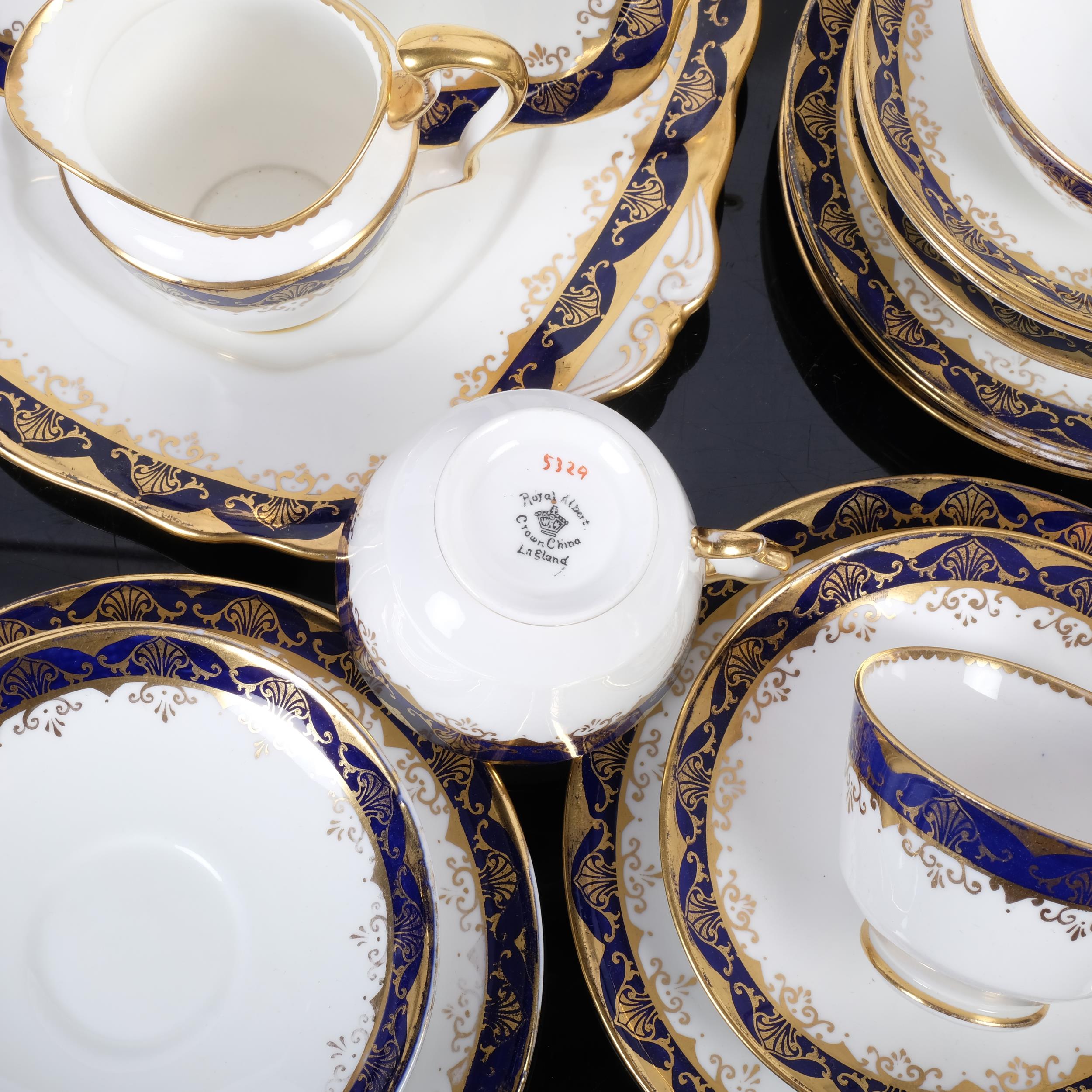 Early Royal Albert Crown china tea set for 5 people, with cobalt blue and gilt patterned borders, - Image 2 of 2