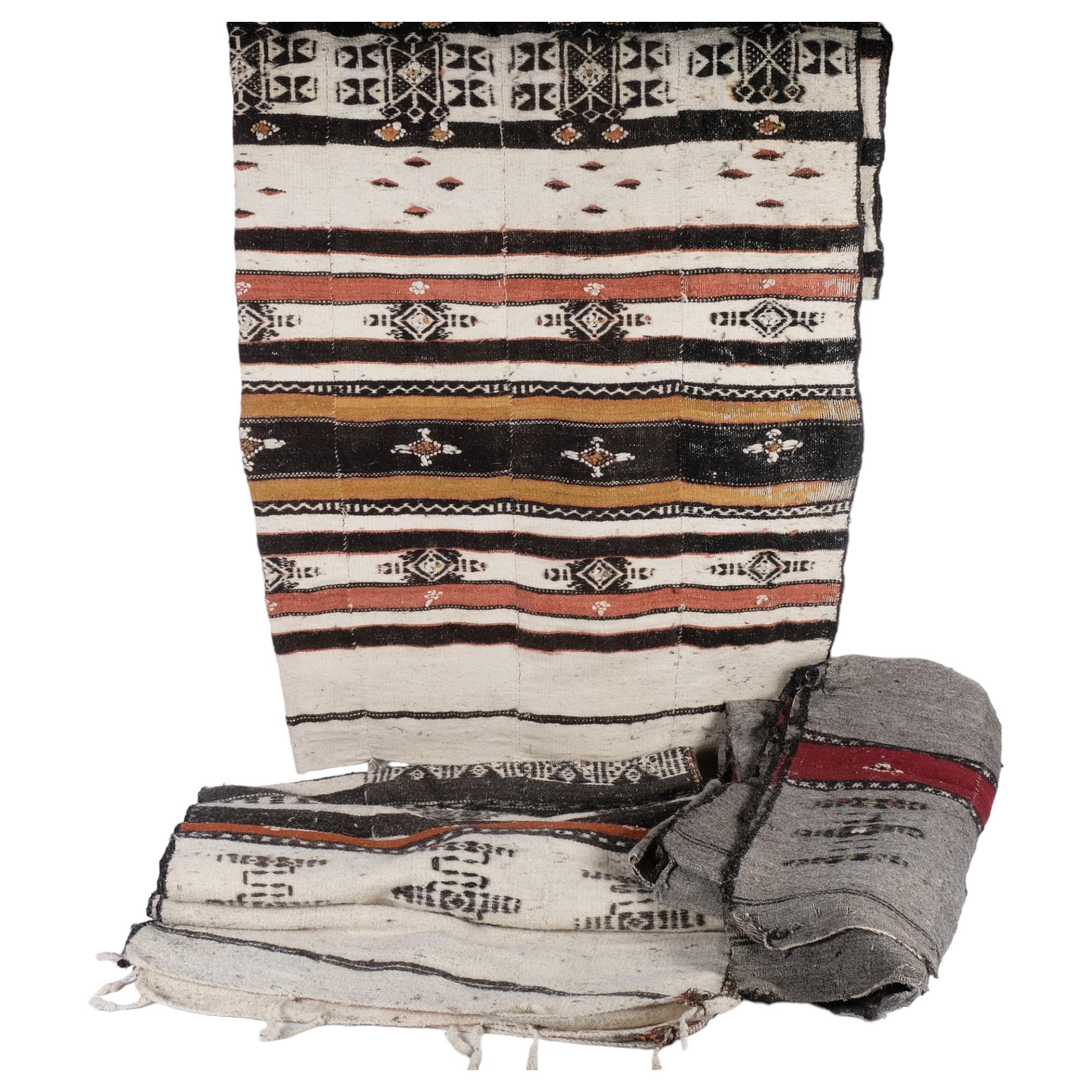 An Ethnic woollen style blanket, with symmetrical decoration, approx 270cm x 150cm, and 2 other