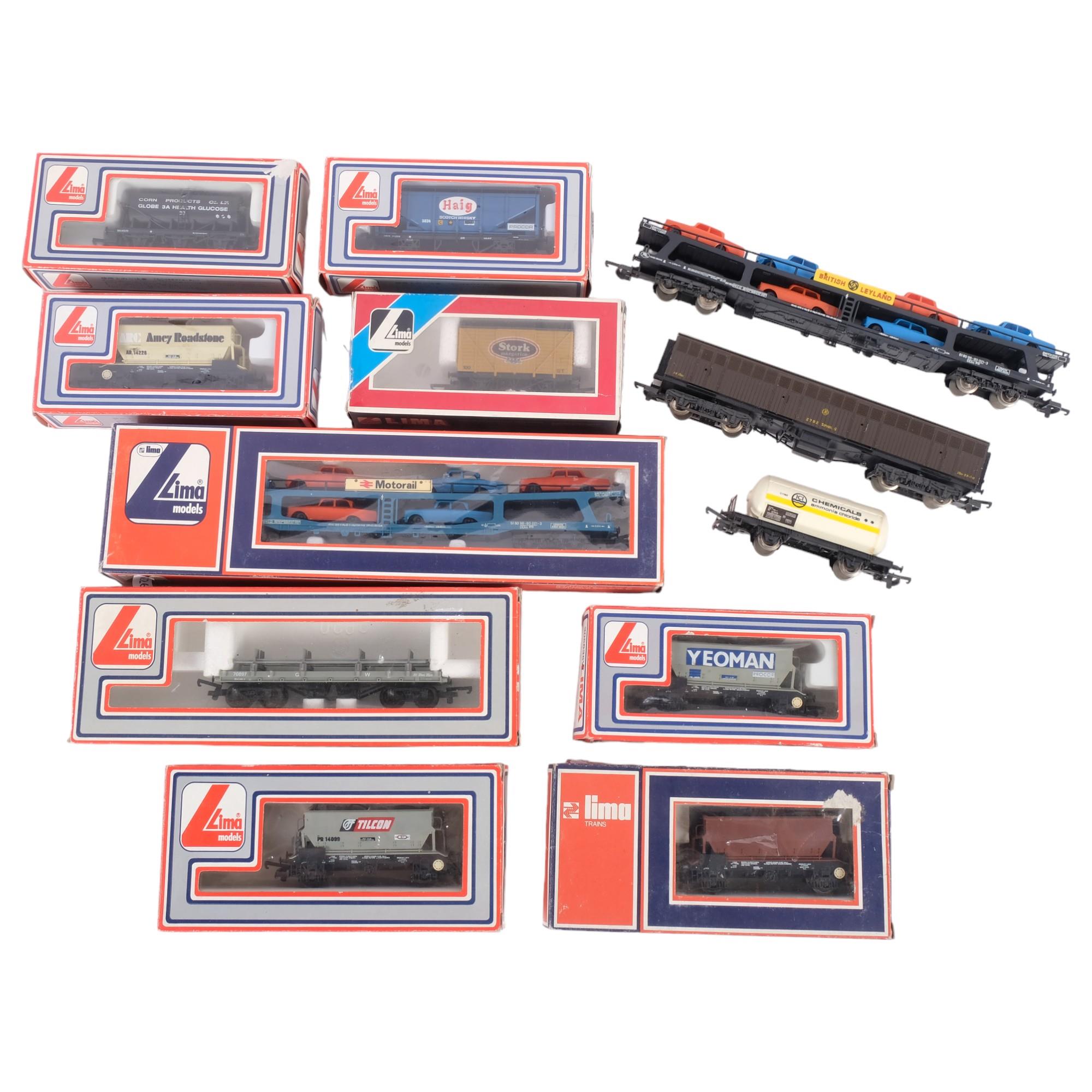 LIMA OO GAUGE - a quantity of boxed and loose Italian-made OO gauge wagons and goods transporters,