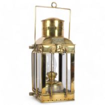 A 19th century brass cargo light, no. 3954, with embossed plaque, height not including handle 38cm