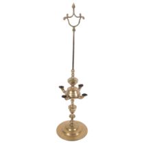 A brass Gothic or Coptic oil lamp, H60cm