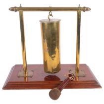 A Vintage brass gong with striker, on mahogany stand, H40cm
