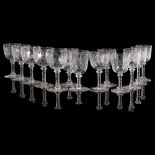 A group of engraved glass goblets of various sizes, all with floral and foliate decoration,