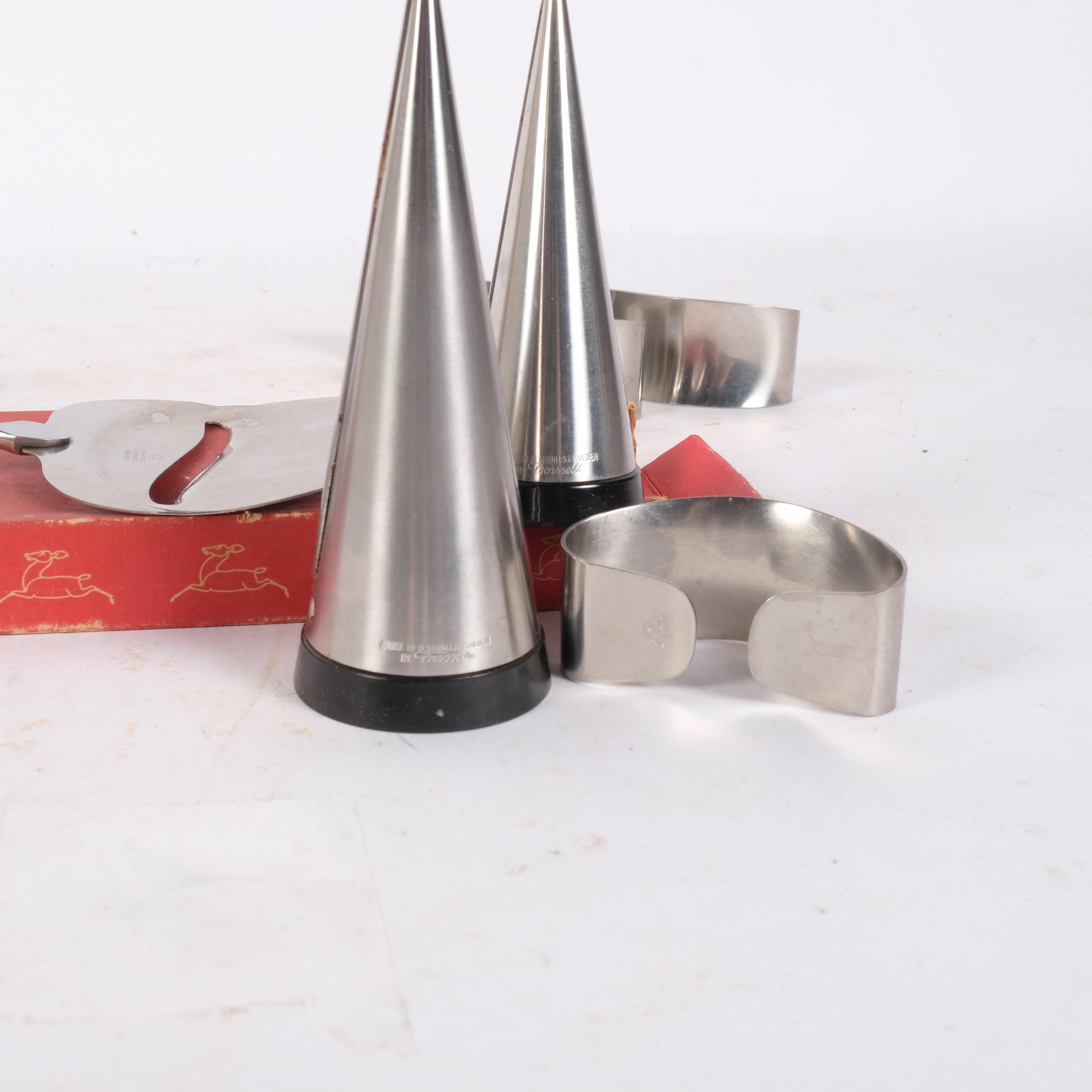 A pair of mid-century stainless steel and black Bakelite salt and pepper shakers, by Pierre - Image 2 of 2