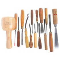 14 various carving chisels, and a carver's mallet