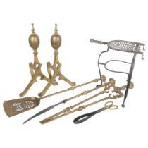 WITHDRAWN - A group of Victorian brass fireside tools, including a trivet, pair of andirons, and a
