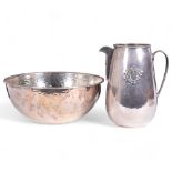 CHRISTIAN DIOR - a hammered silver plated water jug, with embossed monogram, H24cm, and a large