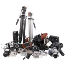 A quantity of Vintage cameras and associated accessories, including a Canon digital IXUSV2, a