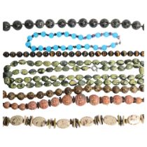 A collection of stone and other bead necklaces, including a tigers eye, turquoise, etc