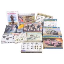 A quantity of plastic model display kits, mostly military related in nature, various brands such