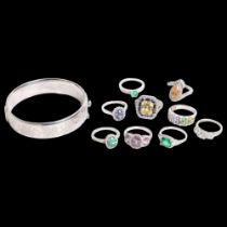 9 various stone set silver dress rings, and an engraved silver hinged bangle