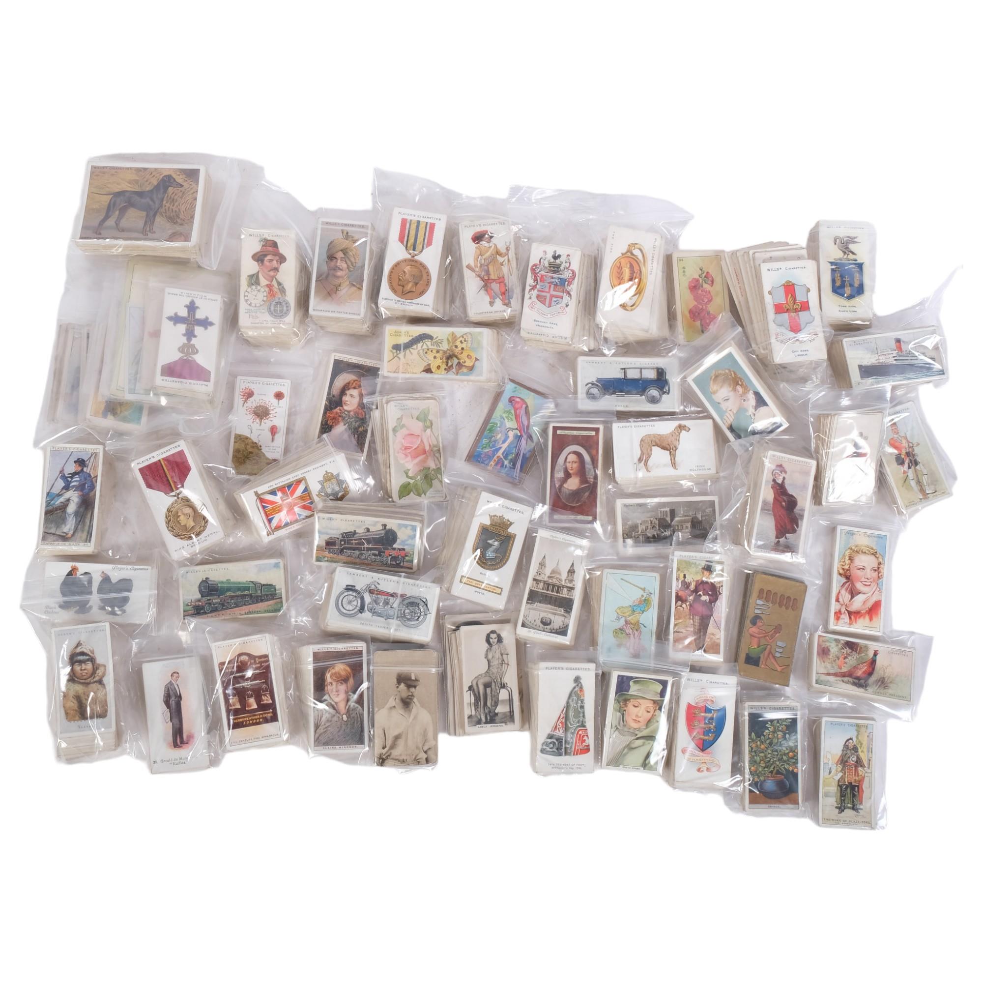 A large quantity of cigarette cards, including Wills's Cigarettes, John Player & Sons, Godfrey