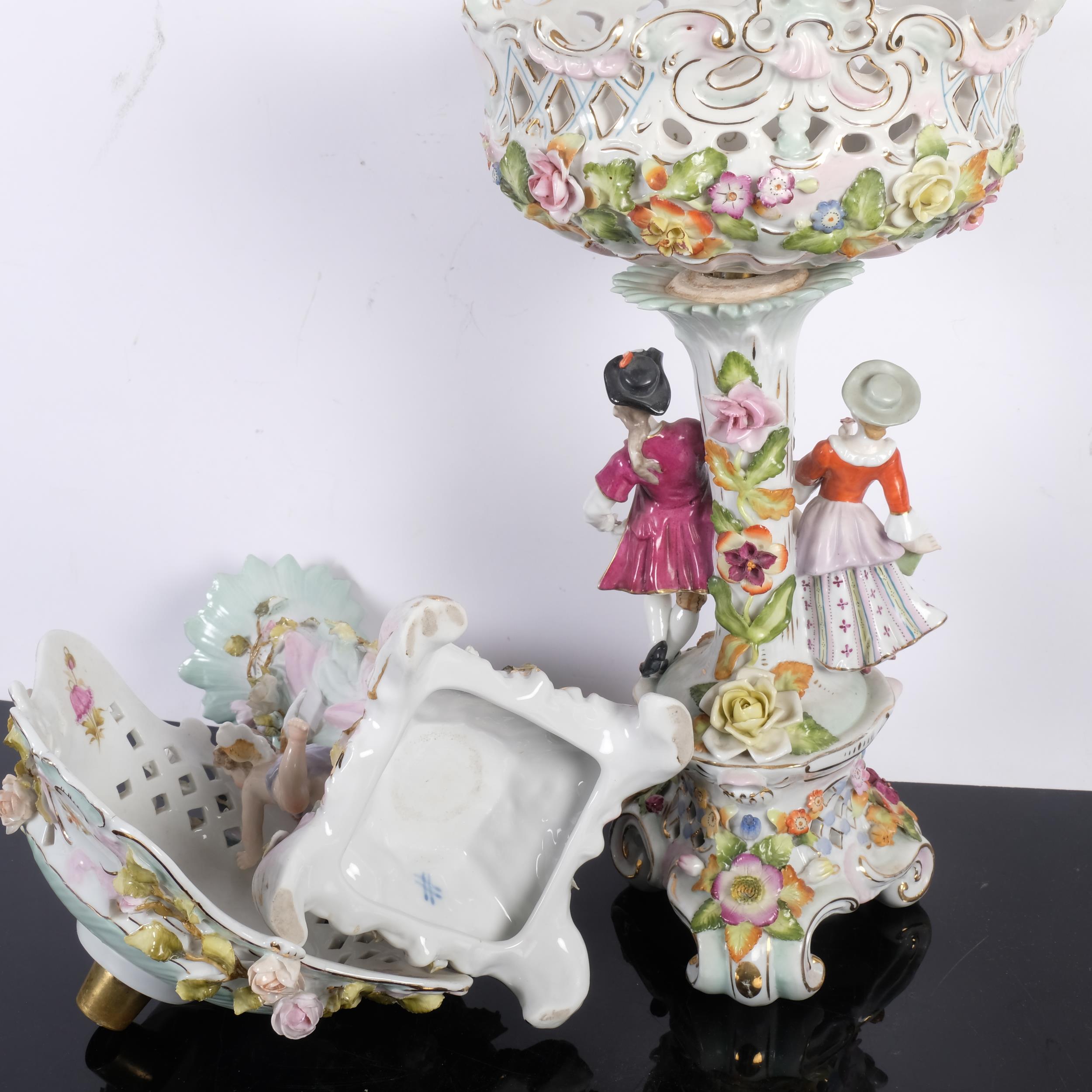 2 German porcelain pierced comports on separate stands, supported by figures, tallest 39cm - Image 2 of 2