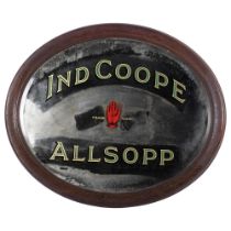 A 20th century oval advertising mirror, "INDCOOPE", Allsopp, W57cm