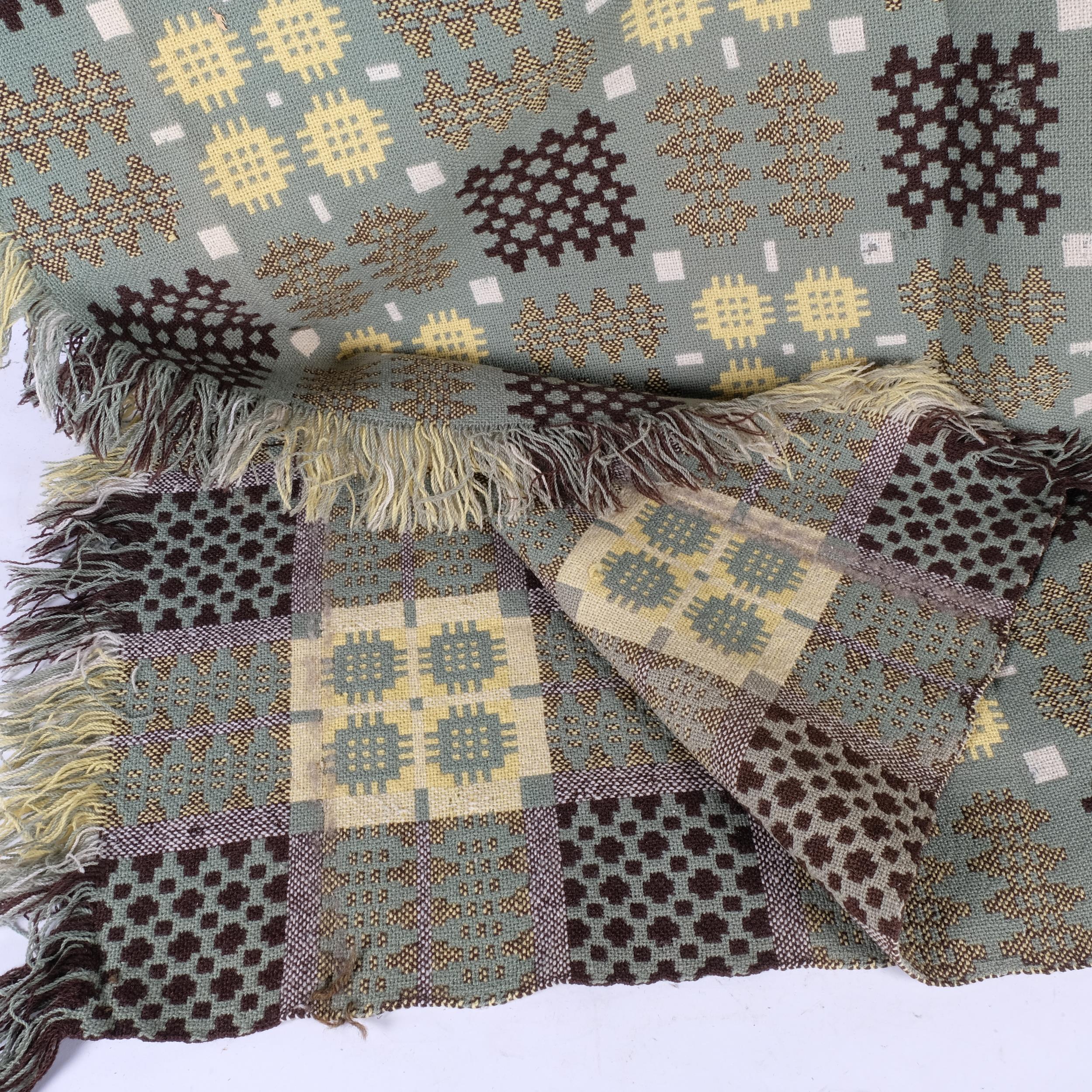 A green ground Welsh woven wool blanket, with black yellow and cream pattern, 224cm x 230cm, - Image 2 of 2