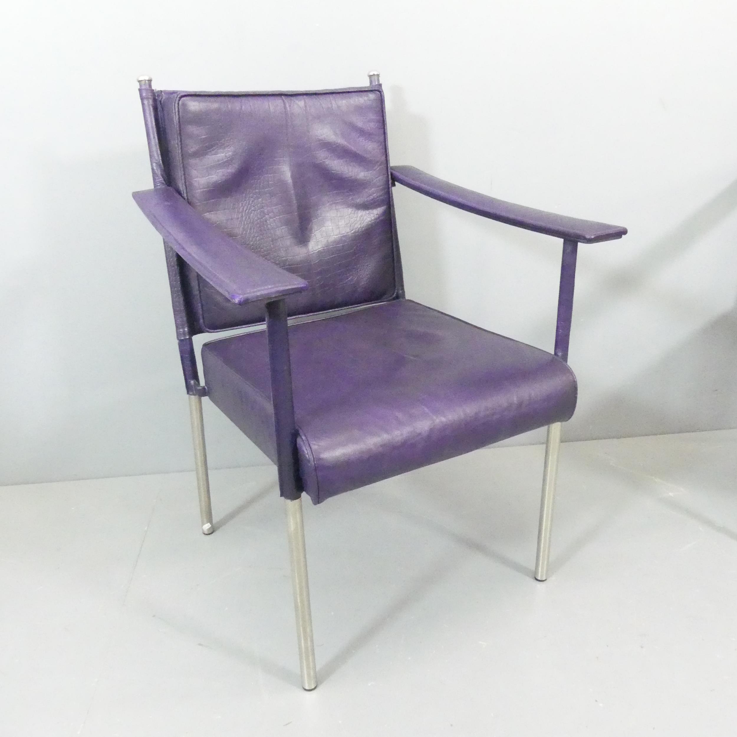 SOANE BRITAIN - a contemporary Crillon leather armchair in the manner of Jacques Adnet , current RRP