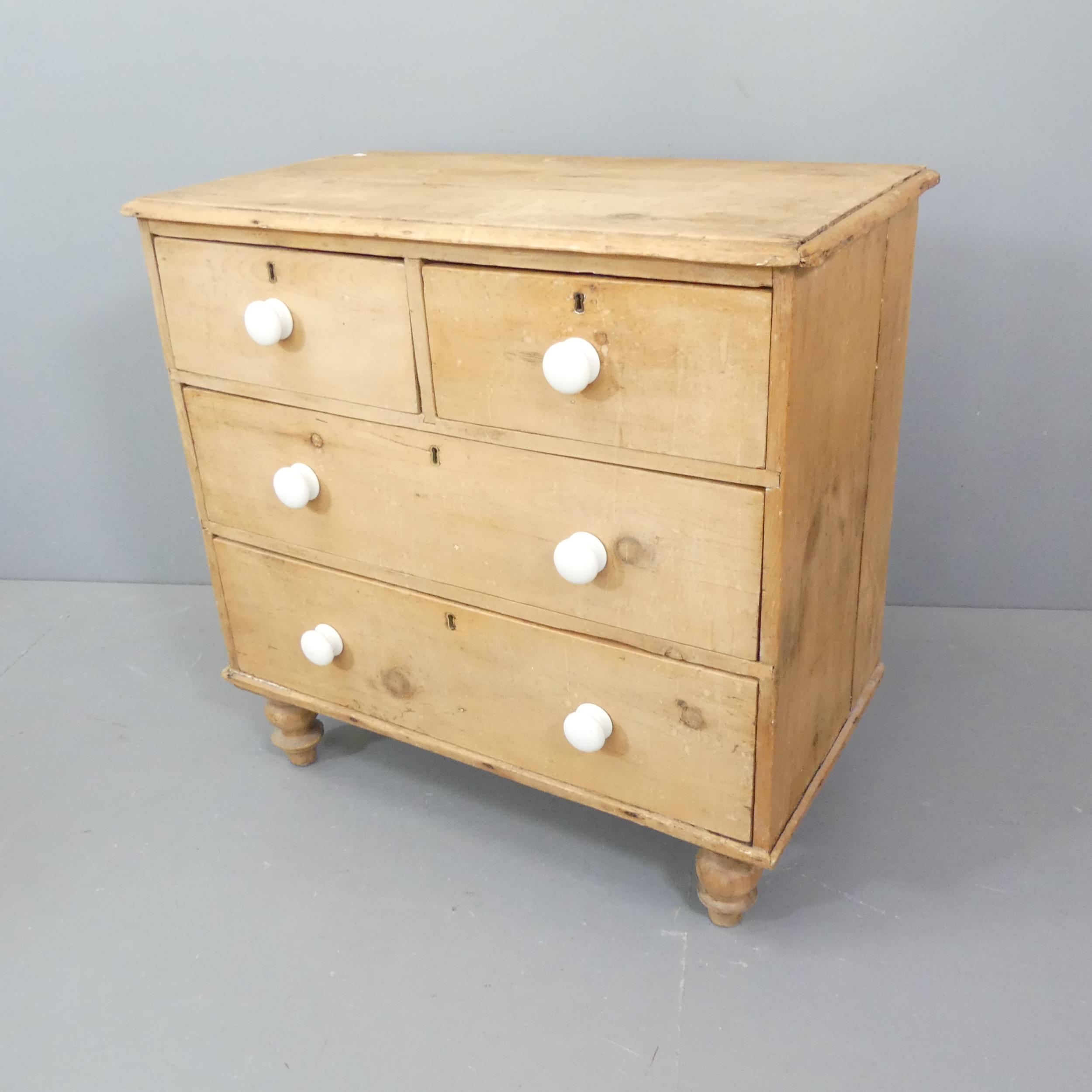 A Victorian pine chest of two short and two long drawers. 85x83x46cm.