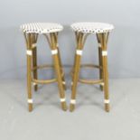A pair of modern metal faux-bamboo bar stools. Height 80cm.