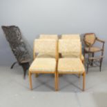An African hardwood birthing chair, with all-over carved decoration, a set of four West German mid-