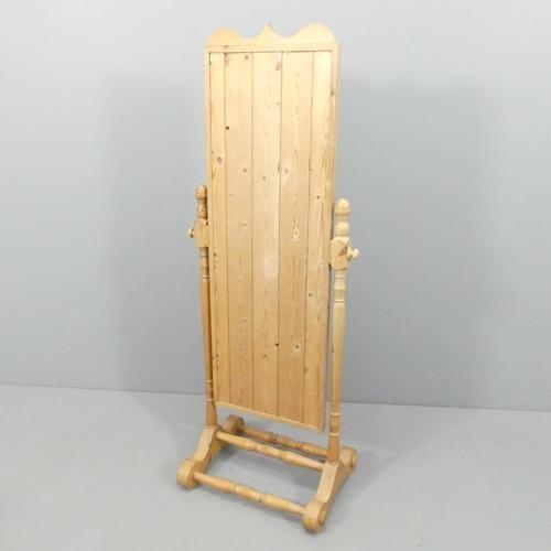 A Victorian style pine framed cheval mirror. 56x147cm. - Image 2 of 2