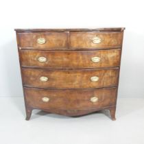 A Georgian mahogany bow-front chest of two short and three long drawers. 109x106x57cm. Splits to