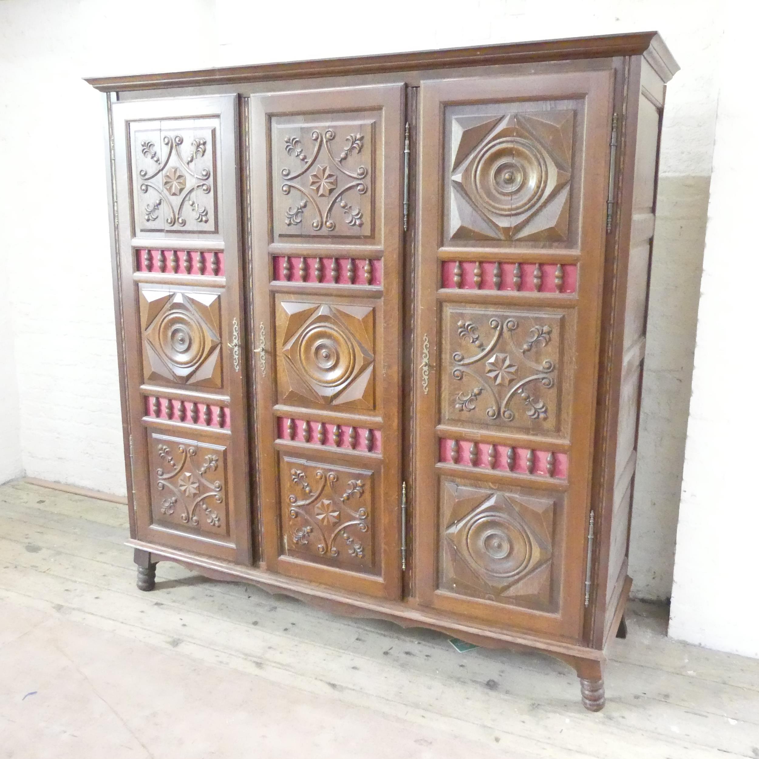 A French oak three-door armoire, with shelf fitted interior. 186x188x56cm. Interior has been